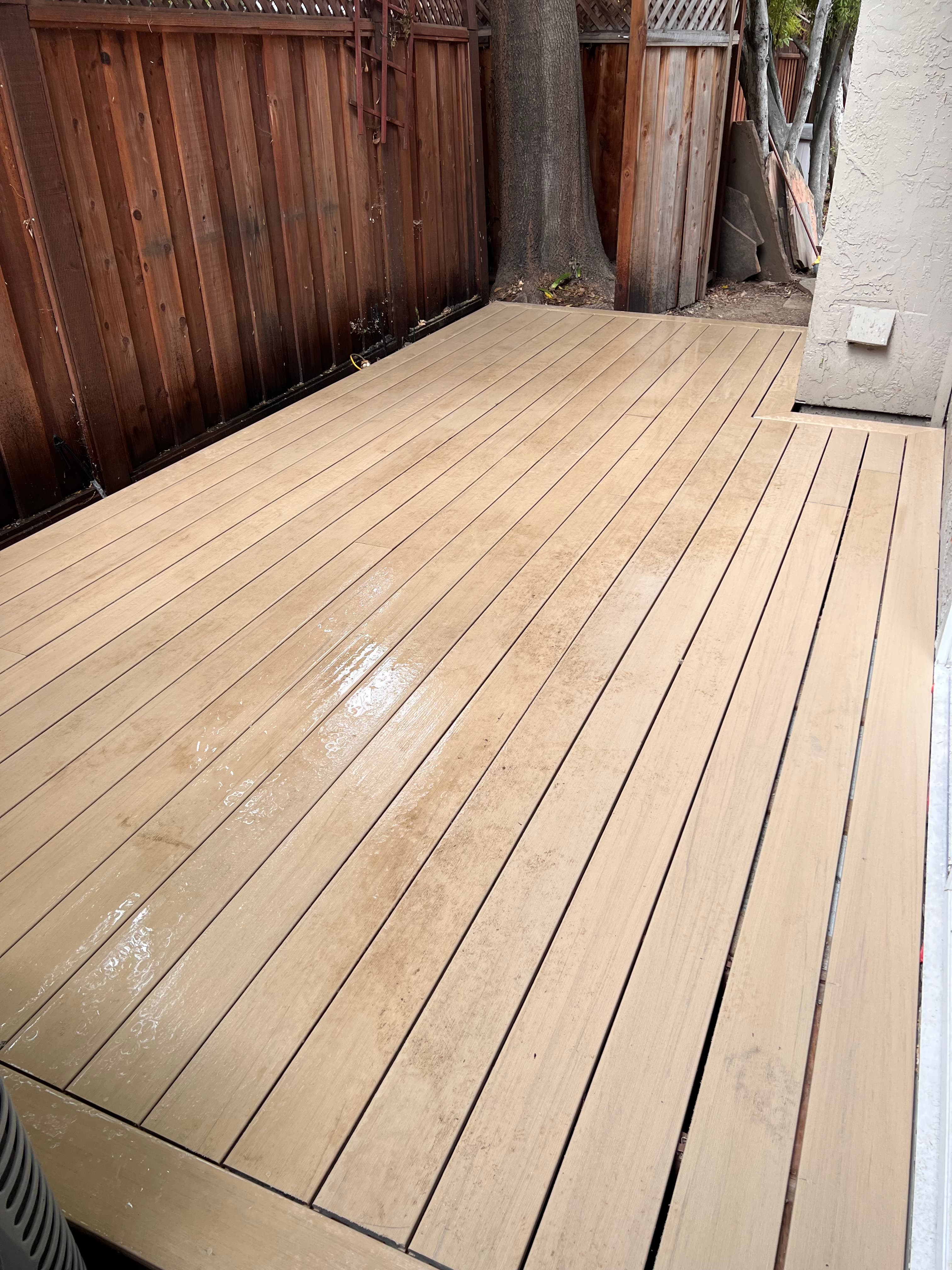 Newly installed composite deck boards by Far West Builders Bay Area deck contractor
